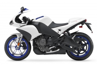 2009 Buell 1125R - Artic White - Left Side: Arctic White with Hero Blue translucent wheels. 2009 Buell 1125R - Artic White - Left Side: Arctic White with Hero Blue translucent wheels.