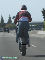 Yamaha R6 Standup (II): Yamaha R6 riding a long freeway standup.